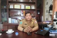 Plt Kepala Dinas Perkebunan Fakfak Widhi Asmoro Jati, ST. MT saat di temui wartawan jateng.tagarutama.com di ruang kerjanya (Dok. jateng.tagarutama.com)